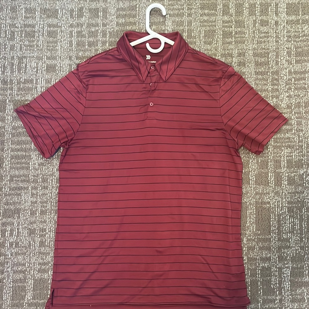 Dark red polo made of 90% polyester/10% spandex. Very breathable shirt